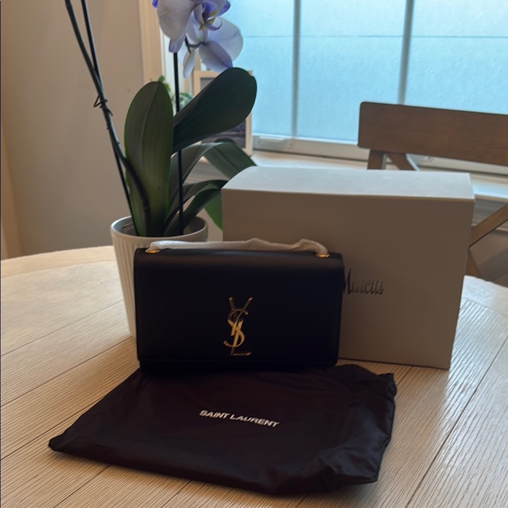 Yves Saint Laurent Black and Gold Clutch